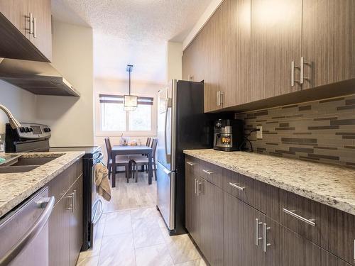 202 10615 156 Street, Edmonton, AB - Indoor Photo Showing Kitchen With Double Sink