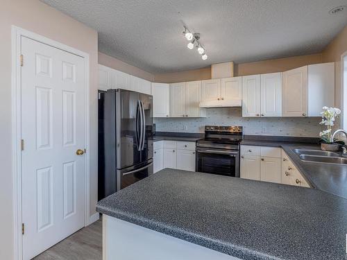 15 6608 158 Avenue, Edmonton, AB - Indoor Photo Showing Kitchen With Double Sink