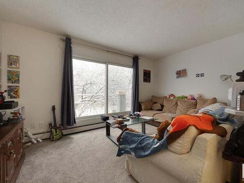 11 10324 119 Street, Edmonton, AB - Indoor Photo Showing Living Room