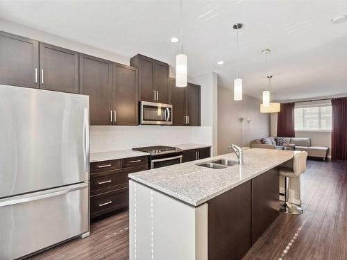 4 320 Secord Boulevard, Edmonton, AB - Indoor Photo Showing Kitchen With Double Sink With Upgraded Kitchen