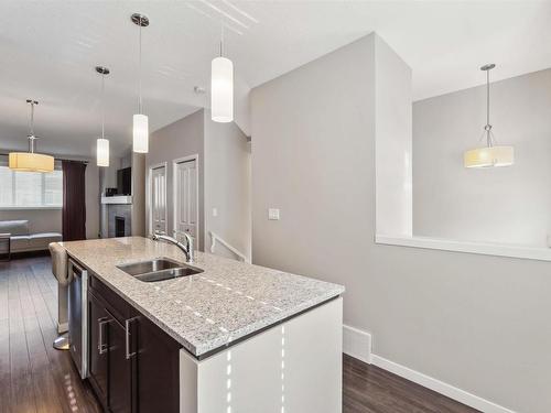 4 320 Secord Boulevard, Edmonton, AB - Indoor Photo Showing Kitchen With Double Sink With Upgraded Kitchen