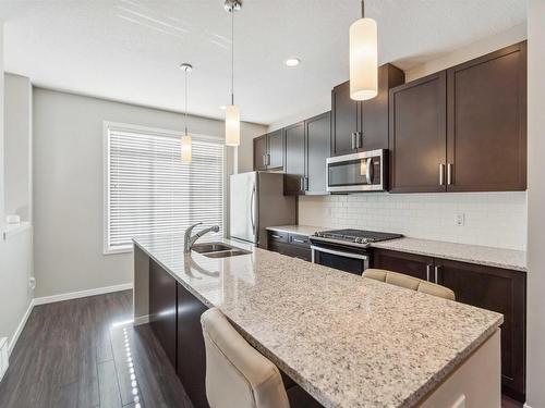 4 320 Secord Boulevard, Edmonton, AB - Indoor Photo Showing Kitchen With Double Sink With Upgraded Kitchen