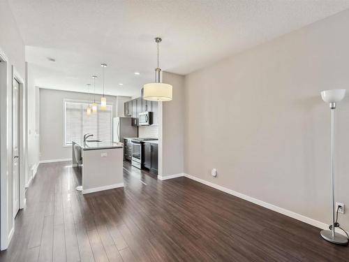 4 320 Secord Boulevard, Edmonton, AB - Indoor Photo Showing Kitchen With Upgraded Kitchen