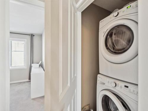 4 320 Secord Boulevard, Edmonton, AB - Indoor Photo Showing Laundry Room