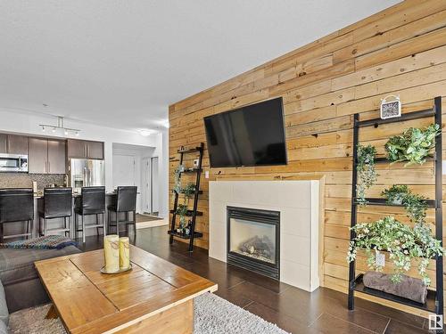 109 11203 103A Avenue, Edmonton, AB - Indoor Photo Showing Living Room With Fireplace