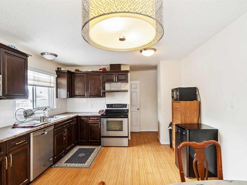 5807 11 Ave, Edmonton, AB - Indoor Photo Showing Kitchen With Double Sink