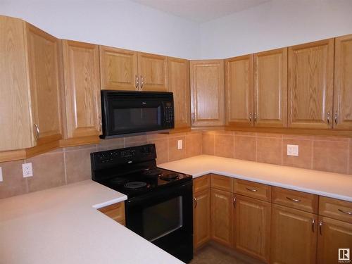 201 160 Magrath Road Nw, Edmonton, AB - Indoor Photo Showing Kitchen