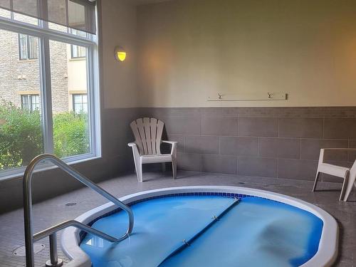 201 160 Magrath Road Nw, Edmonton, AB - Indoor Photo Showing Other Room With In Ground Pool