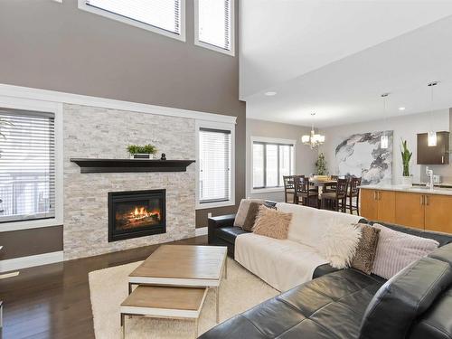 1532 Cunningham Cape, Edmonton, AB - Indoor Photo Showing Living Room With Fireplace