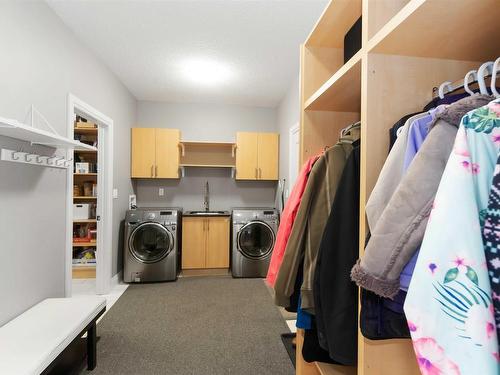 1532 Cunningham Cape, Edmonton, AB - Indoor Photo Showing Laundry Room