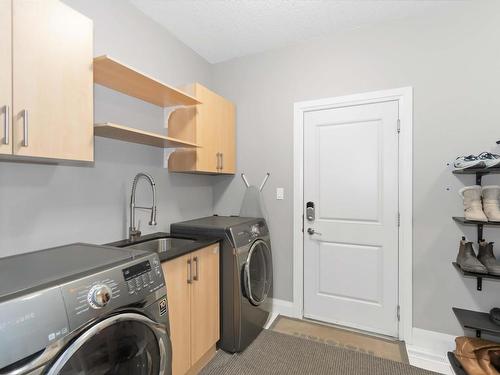 1532 Cunningham Cape, Edmonton, AB - Indoor Photo Showing Laundry Room