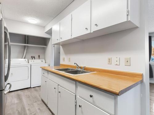 8439 29 Avenue, Edmonton, AB - Indoor Photo Showing Laundry Room