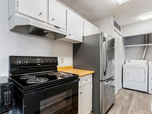 8439 29 Avenue, Edmonton, AB - Indoor Photo Showing Laundry Room