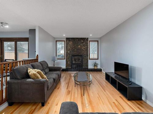 630 Henderson Street, Edmonton, AB - Indoor Photo Showing Living Room With Fireplace