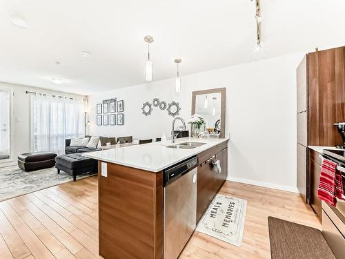 102 9519 160 Avenue, Edmonton, AB - Indoor Photo Showing Kitchen With Double Sink