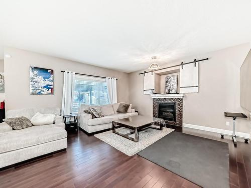 7821 170A Avenue, Edmonton, AB - Indoor Photo Showing Living Room With Fireplace