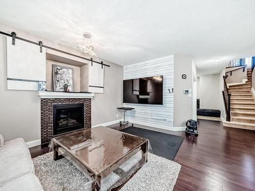 7821 170A Avenue, Edmonton, AB - Indoor Photo Showing Living Room With Fireplace