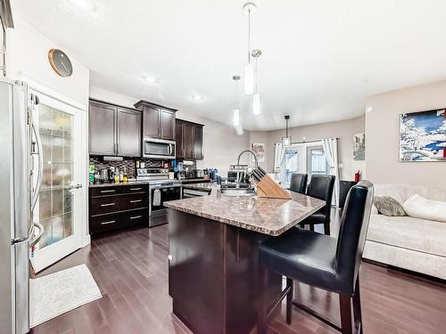 7821 170A Avenue, Edmonton, AB - Indoor Photo Showing Kitchen With Stainless Steel Kitchen With Upgraded Kitchen