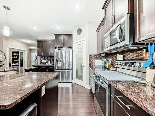 7821 170A Avenue, Edmonton, AB - Indoor Photo Showing Kitchen With Stainless Steel Kitchen With Upgraded Kitchen