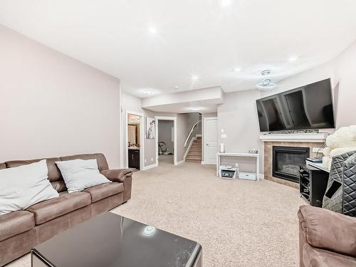 7821 170A Avenue, Edmonton, AB - Indoor Photo Showing Living Room With Fireplace