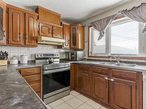 13448 113 Street Nw, Edmonton, AB - Indoor Photo Showing Kitchen With Double Sink