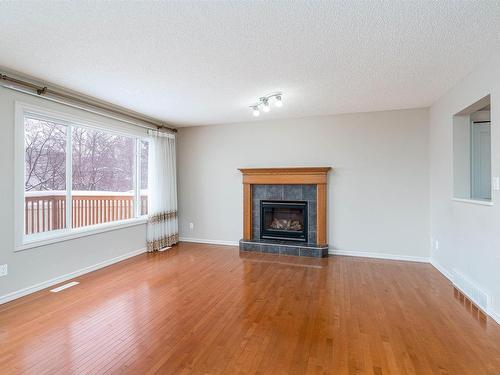 1209 Latta Crescent, Edmonton, AB - Indoor Photo Showing Living Room With Fireplace