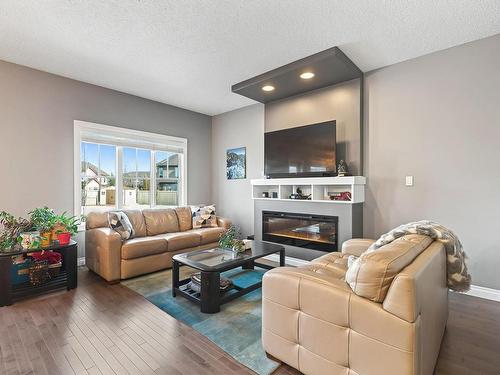 4035 Allan Crescent, Edmonton, AB - Indoor Photo Showing Living Room With Fireplace