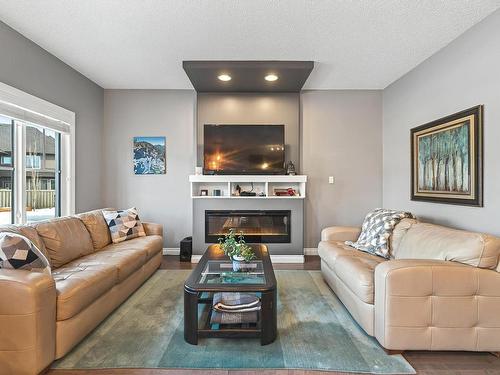 4035 Allan Crescent, Edmonton, AB - Indoor Photo Showing Living Room With Fireplace