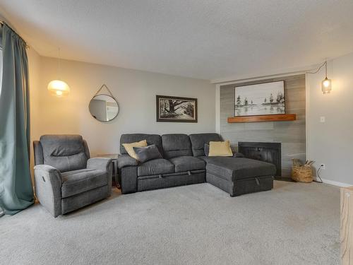 13413 43 Street, Edmonton, AB - Indoor Photo Showing Living Room With Fireplace