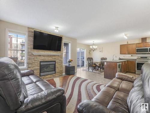 6418 16 Avenue, Edmonton, AB - Indoor Photo Showing Living Room With Fireplace