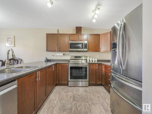 6418 16 Avenue, Edmonton, AB - Indoor Photo Showing Kitchen With Stainless Steel Kitchen With Double Sink