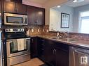 331 11603 Ellerslie Road, Edmonton, AB  - Indoor Photo Showing Kitchen With Stainless Steel Kitchen With Double Sink 