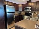 331 11603 Ellerslie Road, Edmonton, AB  - Indoor Photo Showing Kitchen With Stainless Steel Kitchen With Double Sink With Upgraded Kitchen 