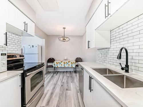 4 14120 80 Street, Edmonton, AB - Indoor Photo Showing Kitchen With Double Sink With Upgraded Kitchen