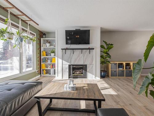 8612 152A Avenue, Edmonton, AB - Indoor Photo Showing Living Room With Fireplace