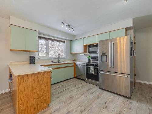 8612 152A Avenue, Edmonton, AB - Indoor Photo Showing Kitchen With Double Sink