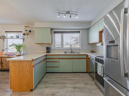 8612 152A Avenue, Edmonton, AB - Indoor Photo Showing Kitchen With Double Sink