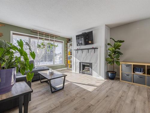 8612 152A Avenue, Edmonton, AB - Indoor Photo Showing Living Room With Fireplace