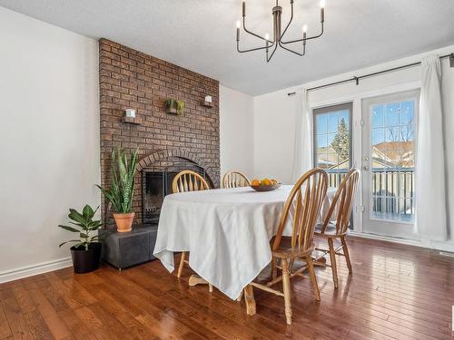 5912 11 Avenue Nw, Edmonton, AB - Indoor Photo Showing Dining Room With Fireplace