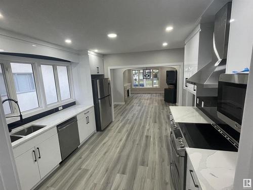 10505 76 Street, Edmonton, AB - Indoor Photo Showing Kitchen With Double Sink