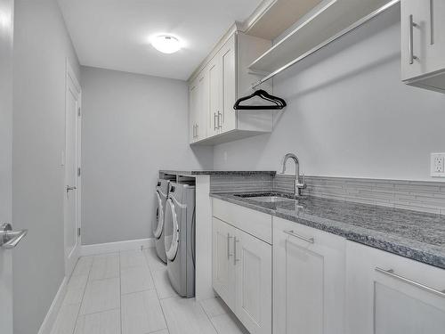 4510 Wingfield Bay, Edmonton, AB - Indoor Photo Showing Laundry Room