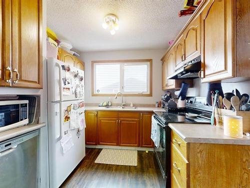 1230 62 St, Edmonton, AB - Indoor Photo Showing Kitchen With Double Sink