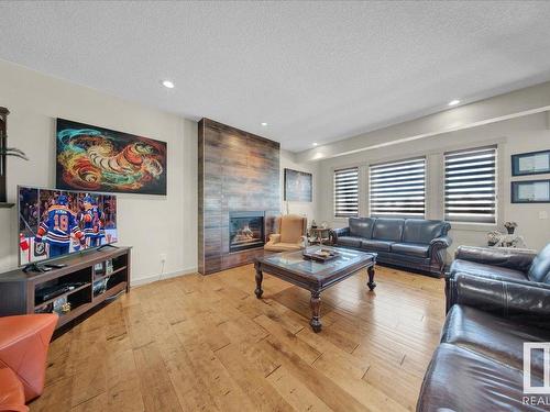 15836 13 Avenue Sw, Edmonton, AB - Indoor Photo Showing Living Room With Fireplace