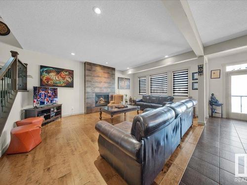 15836 13 Avenue Sw, Edmonton, AB - Indoor Photo Showing Living Room With Fireplace