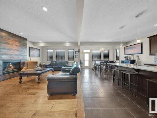 15836 13 Avenue Sw, Edmonton, AB - Indoor Photo Showing Living Room With Fireplace