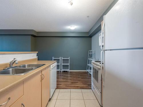 101 17011 67 Avenue, Edmonton, AB - Indoor Photo Showing Kitchen With Double Sink