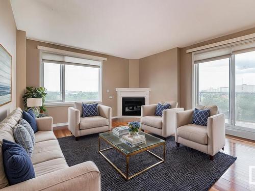 1001 10649 Saskatchewan Drive, Edmonton, AB - Indoor Photo Showing Living Room With Fireplace