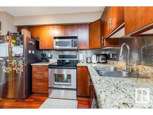 1001 10649 Saskatchewan Drive, Edmonton, AB - Indoor Photo Showing Kitchen With Stainless Steel Kitchen With Double Sink