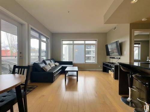 203 9908 84 Avenue, Edmonton, AB - Indoor Photo Showing Living Room