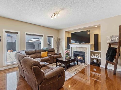 16724 60 Street, Edmonton, AB - Indoor Photo Showing Living Room With Fireplace